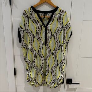 Vibrant Patterned Blouse with Black Trim